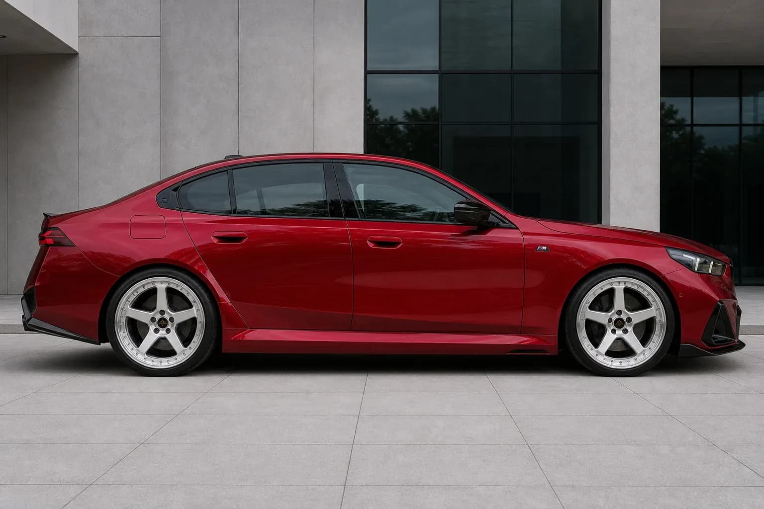 2025 BMW M5 with EW-O-BL-001 wheel, side profile view