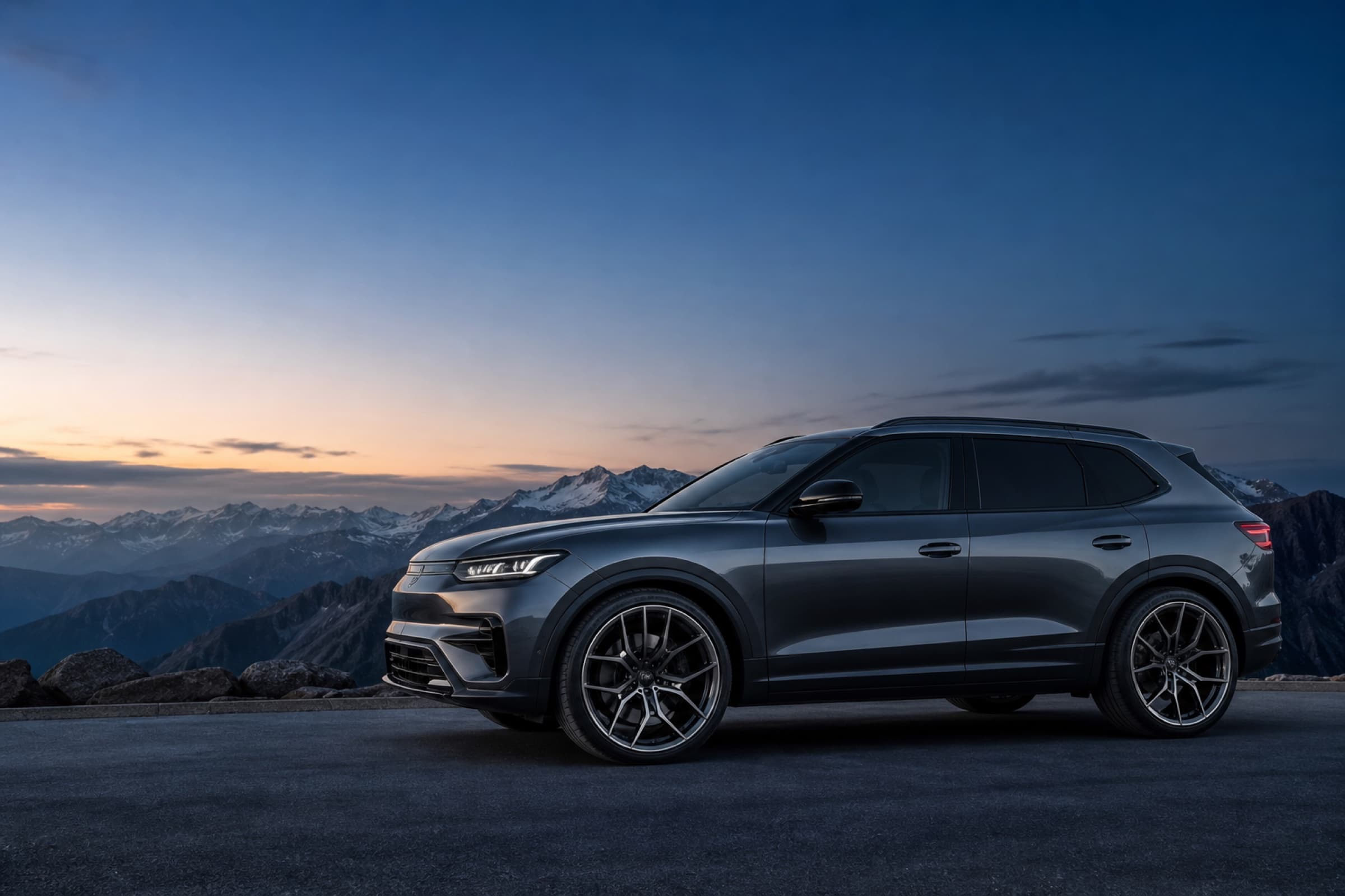 Premium SUV with satin black Everest forged wheels at a mountain overlook