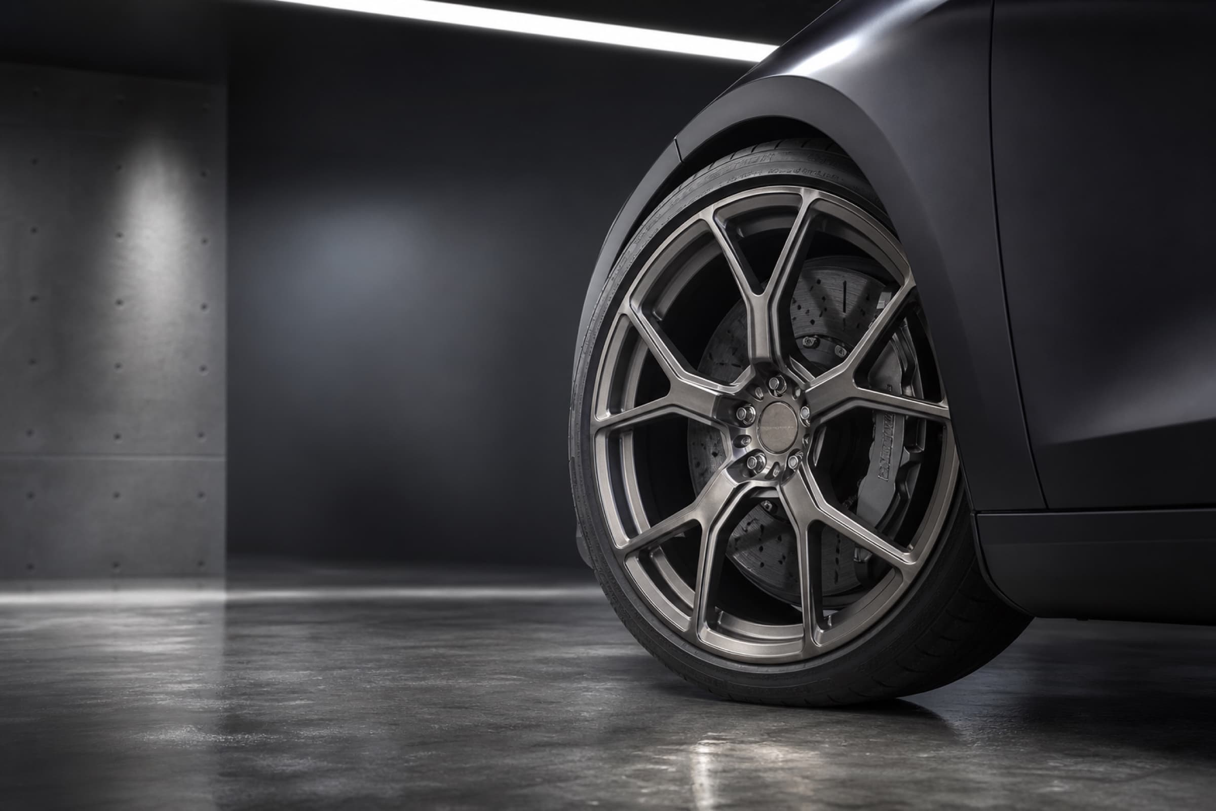 Close-up studio photograph of a machined Everest forged wheel