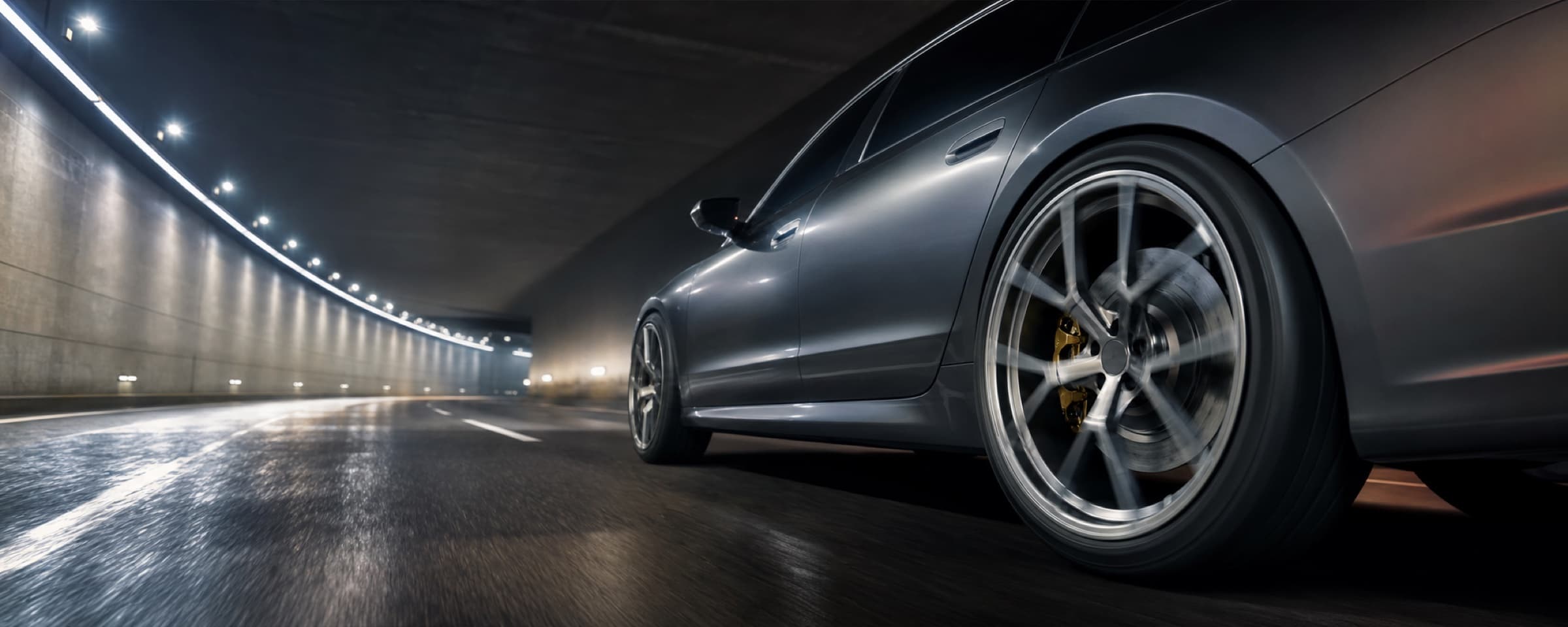 Everest Summit GT forged wheels on a performance coupe in a modern tunnel